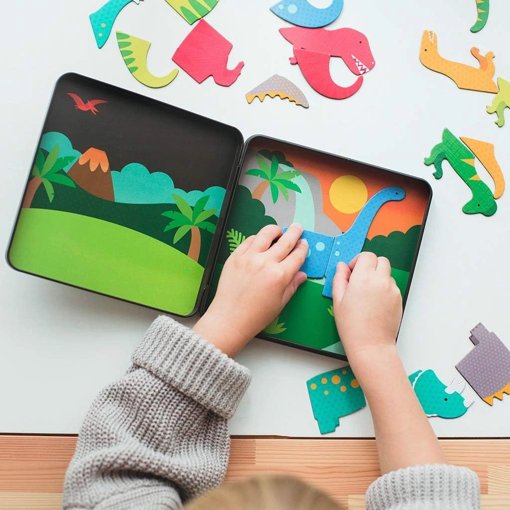 Petit Collage Dinosaur Mix & Match Magnetic Game Board - Ideal for Ages 3 , Includes 2 Scenes and 25  Magnet Pieces, Perfect Travel Activity
