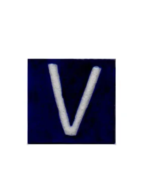 White V alphabet blue tile (2x2)